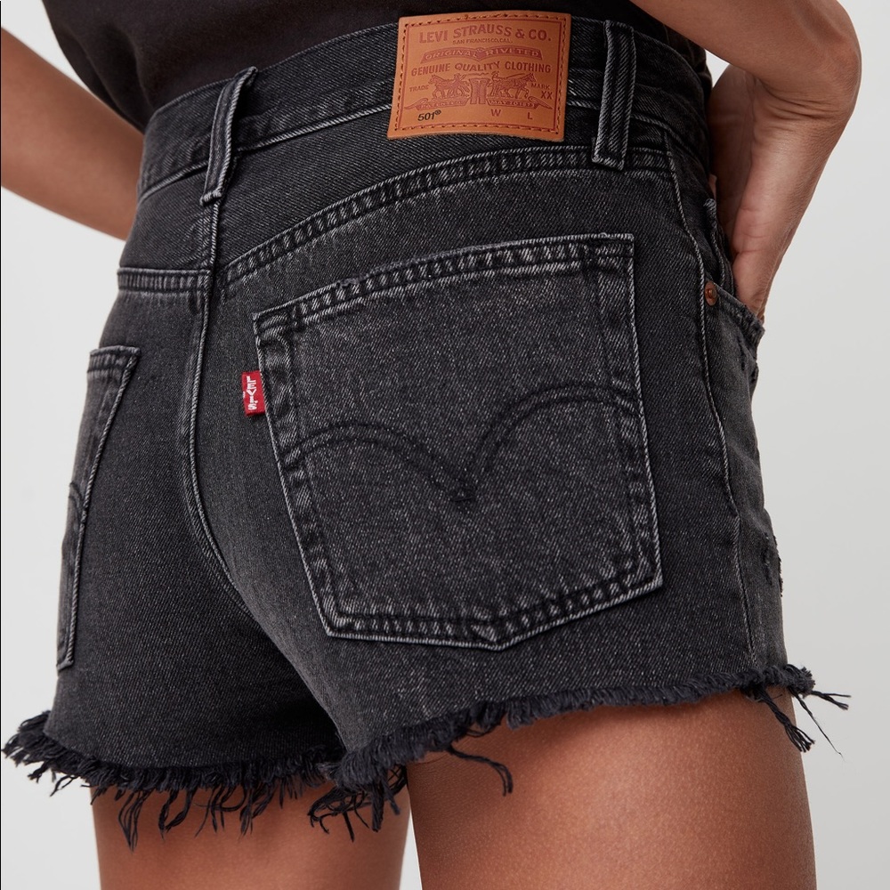 Distressed black vintage Levi’s cut offs